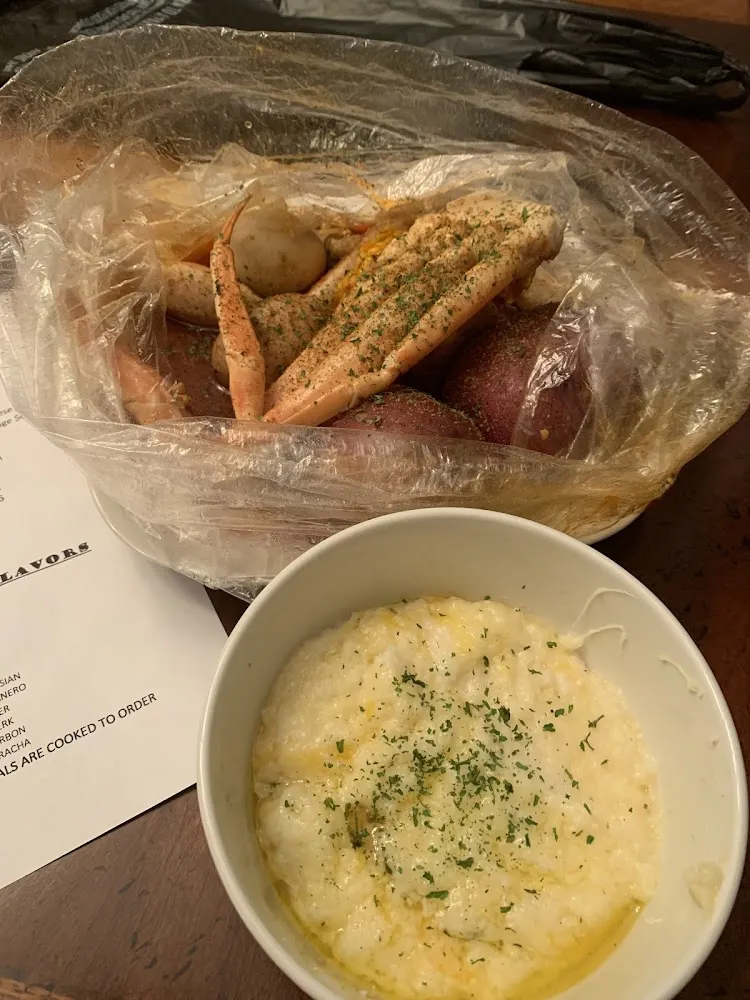 Seafood Bag Including Crab Leg's Potatoes Eggs an Corn